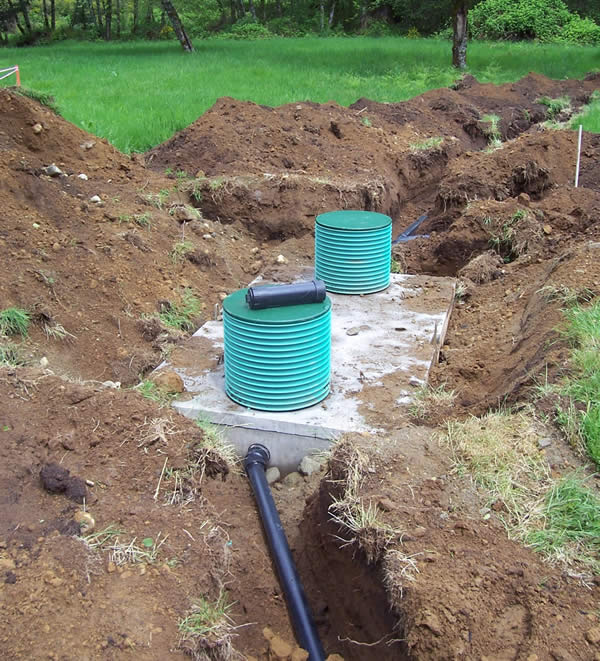 A 2 compartment septic tanks installed for a gravity septic system.